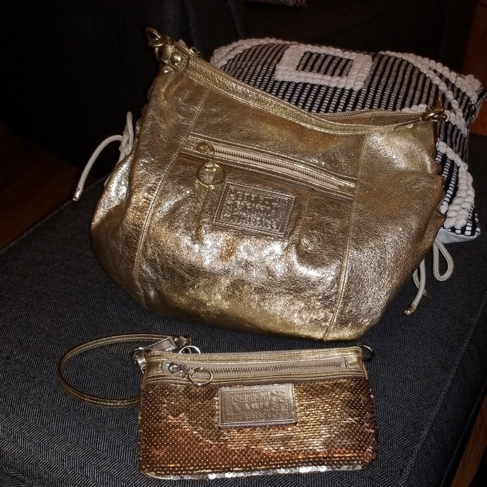 Gold Coach bag with wristlet